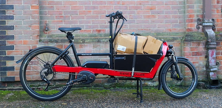 Black and red electric delivery bike with front storage